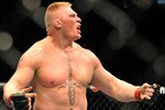 LAS VEGAS - JULY 11:  Brock Lesnar reacts after knocking out Frank Mir during their heavyweight title bout during UFC 100 on July 11, 2009 in Las Vegas, Nevada.  (Photo by Jon Kopaloff/Getty Images)