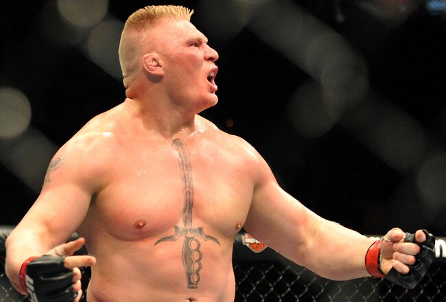 LAS VEGAS - JULY 11:  Brock Lesnar reacts after knocking out Frank Mir during their heavyweight title bout during UFC 100 on July 11, 2009 in Las Vegas, Nevada.  (Photo by Jon Kopaloff/Getty Images)