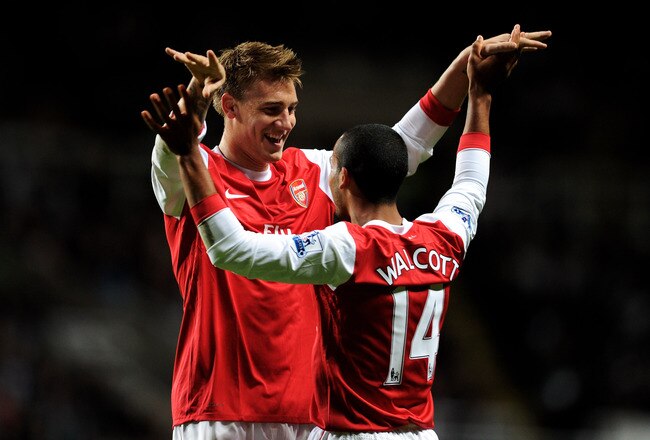 NEWCASTLE UPON TYNE, ENGLAND - OCTOBER 27:  Nicklas Bendtner of Arsenal celebrates the opening goal with team mate Theo Walcott during the Carling Cup Fourth Round match between Newcastle United and Arsenal at St James' Park on October 27, 2010 in Newcastle, England.  (Photo by Michael Regan/Getty Images)