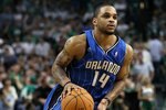 BOSTON - MAY 28:  Jameer Nelson #14 of the Orlando Magic drives against the Boston Celtics in Game Six of the Eastern Conference Finals during the 2010 NBA Playoffs at TD Garden on May 28, 2010 in Boston, Massachusetts.  NOTE TO USER: User expressly acknowledges and agrees that, by downloading and/or using this Photograph, user is consenting to the terms and conditions of the Getty Images License Agreement.  (Photo by Elsa/Getty Images)