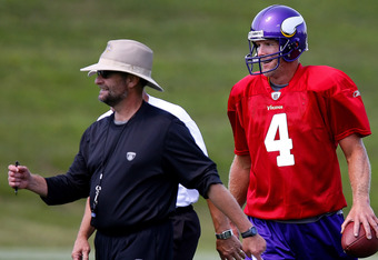 EDEN PRAIRIE, MN - AUGUST 18: Minnesota Vikings Head Coach Brad Childress (L) walks with Brett Favre #4 after finishing a passing drill during a Minnesota Vikings practice session on August 18, 2009 at Winter Park in Eden Prairie, Minnesota. Favre has reportedly agreed to play for the Vikings, a reversal of his announced retirement. (Photo by Scott A. Schneider/Getty Images)