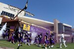 GREENVILLE, NC - SEPTEMBER 05:  Head coach Skip Holtz of the East Carolina Pirates walks onto the field with his team before their game against the Appalachian State Mountaineers at Dowdy-Ficklen Stadium on September 5, 2009 in Greenville, North Carolina.  (Photo by Streeter Lecka/Getty Images)