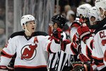 ANAHEIM, CA - OCTOBER 29:  Patrik Elias #26 of the New Jersey Devils celebrates his goal with the bench to take a 2-1 lead over the Anaheim Ducks during thr third periof at the Honda Center on October 29, 2010 in Anaheim, California.  (Photo by Harry How/Getty Images)