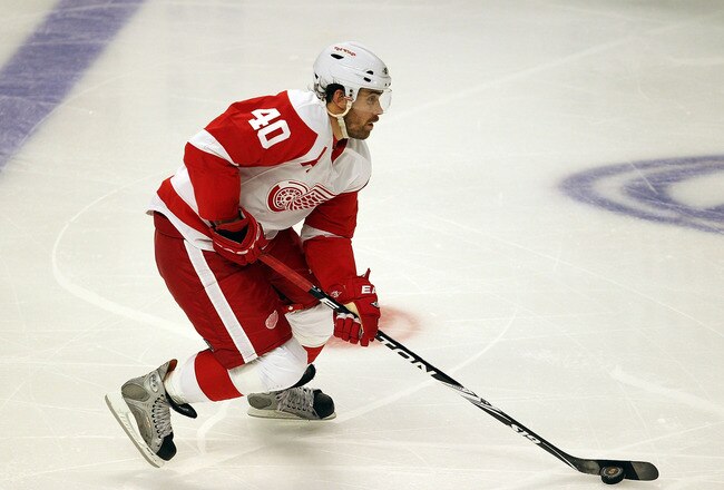 CHICAGO - OCTOBER 09: Henrik Zetterberg #40 of the Detroit Red Wings skates up the ice against the Chicago Blackhawks during the Blackhawks season home opening game at the United Center on October 9, 2010 in Chicago, Illinois. The Red Wings defeated the Blackhawks 3-2. (Photo by Jonathan Daniel/Getty Images)