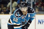 SAN JOSE, CA - SEPTEMBER 25:  Dan Boyle #22 of the San Jose Sharks waits for a face-off against the Phoenix Coyotes in a preseason split-squad game at HP Pavilion on September 25, 2010 in San Jose, California.  The Sharks won 3-1.  (Photo by Brian Bahr/Getty Images)