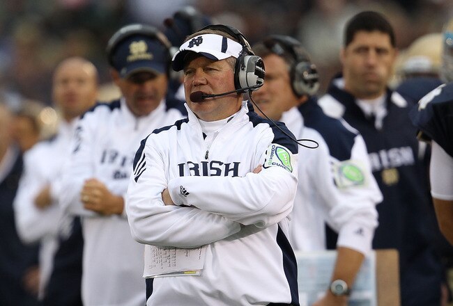 SOUTH BEND, IN - SEPTEMBER 25: Head coach Brian Kelly of the Notre Dame Fighting Irish watches as his team takes on the Stanford Cardinal at Notre Dame Stadium on September 25, 2010 in South Bend, Indiana. Stanford defeated Notre Dame 37-14.  (Photo by Jonathan Daniel/Getty Images)