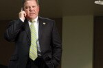 SOUTH BEND, IN - DECEMBER 11: Brian Kelly talks on his phone shortly after being named new football head coach at Notre Dame University on December 11, 2009 in South Bend, Indiana.  Kelly most recently led the University of Cincinnati to two consecutive Bowl Championship Series appearances including a perfect 12-0 record this past season. (Photo by Frank Polich/Getty Images)