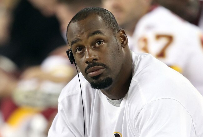 GLENDALE, AZ - SEPTEMBER 02:  Quarterback Donovan McNabb #5 of the Washington Redskins sits on the sidelines during preseason NFL game against the Arizona Cardinals at the University of Phoenix Stadium on September 2, 2010 in Glendale, Arizona.  The Cardinals defeated the Redskins 20-10.  (Photo by Christian Petersen/Getty Images)