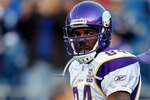 FOXBORO, MA - OCTOBER 31:  Randy Moss #84 of the Minnesota Vikings runs onto the field before a game against the New England Patriots at Gillette Stadium on October 31, 2010 in Foxboro, Massachusetts. (Photo by Jim Rogash/Getty Images)