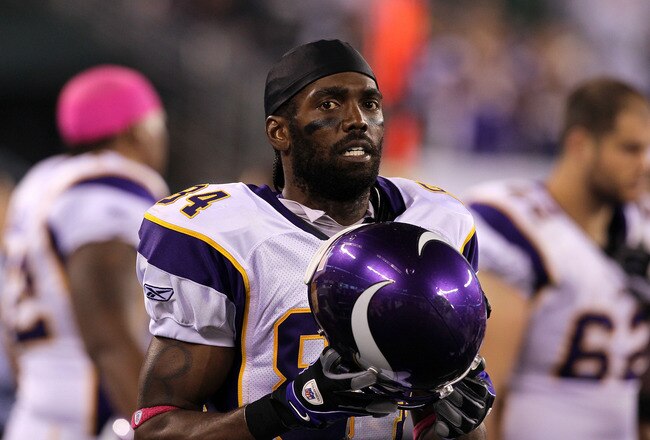 EAST RUTHERFORD, NJ - OCTOBER 11:  Randy Moss #84 of the Minnesota Vikings looks on against the New York Jets at New Meadowlands Stadium on October 11, 2010 in East Rutherford, New Jersey. The Jets won 29-20.  (Photo by Jim McIsaac/Getty Images)