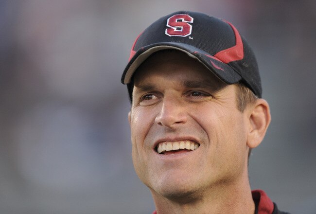 PASADENA, CA - SEPTEMBER 11:  Head Coach Jim Harbaugh of Stanford smiles before the game against UCLA at the Rose Bowl on September 11, 2010 in Pasadena, California.  (Photo by Harry How/Getty Images)