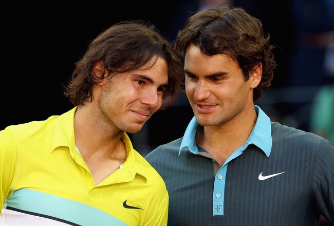 MADRID, SPAIN - MAY 17:  Roger Federer of Switzerland (R) and Rafael Nadal of Spain share a moment during the prize giving ceremony after the mens final during the Madrid Open tennis tournament at the Caja Magica on May 17, 2009 in Madrid, Spain.  (Photo by Clive Brunskill/Getty Images)