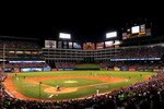 ARLINGTON, TX - NOVEMBER 01:  (***EDITORS NOTE*** THIS PANORAMIC COMPOSITE IMAGE WAS CREATED USING PHOTO STITCHING SOFTWARE) Starting pitcher Tim Lincecum #55 of the San Francisco Giants pitches against the Texas Rangers in Game Five of the 2010 MLB World Series at Rangers Ballpark in Arlington on November 1, 2010 in Arlington, Texas.  (Photo by Ronald Martinez/Getty Images)