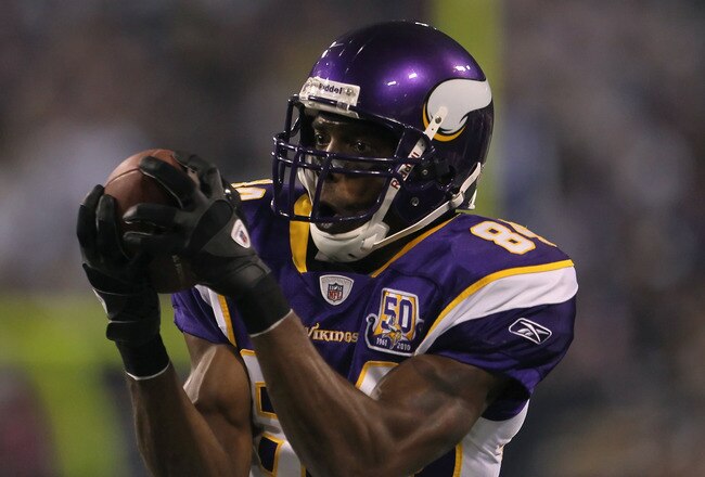 MINNEAPOLIS - OCTOBER 17:  Wide receiver Randy Moss #84 of the Minnesota Vikings catches a pass during the third quarter against the Dallas Cowboys at Mall of America Field on October 17, 2010 in Minneapolis, Minnesota. The Vikings defeated the Cowboys 24-21.  (Photo by Jeff Gross/Getty Images)