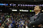 KANSAS CITY, MO - MARCH 13:  Head coach Bill Self of the Kansas Jayhawks watches highlights on the videoboard after the Jayhawks defeated the Kansas State Wildcats to win the 2010 Phillips 66 Big 12 Men's Basketball Championship on March 13, 2010 at the Sprint Center in Kansas City, Missouri.  (Photo by Jamie Squire/Getty Images)