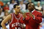 GREENSBORO, NC - MARCH 11: Javier Gonzalez  #10 confers with head coach Sidney Lowe of the Clemson Tigers during their game against the NC State Wolfpack in the first round in the 2010 ACC Men's Basketball Tournament at the Greensboro Coliseum on March 11, 2010 in Greensboro, North Carolina.  (Photo by Jeff Zelevansky/Getty Images)