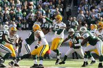 EAST RUTHERFORD, NJ - OCTOBER 31: Aaron Rodgers #12 of the Green Bay Packers throws a pass against the New York Jets on October 31, 2010 at the New Meadowlands Stadium in East Rutherford, New Jersey. (Photo by Jim McIsaac/Getty Images)