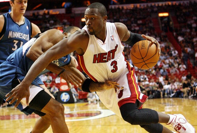 MIAMI - NOVEMBER 02:  Guard Dwyane Wade #3 of the Miami Heat drives while playing against forward Anthony Tolliver #44 of the Minnesota Wolves at American Airlines Arena on November 2, 2010 in Miami, Florida. NOTE TO USER: User expressly acknowledges and agrees that, by downloading and or using this photograph, User is consenting to the terms and conditions of the Getty Images License Agreement.  (Photo by Marc Serota/Getty Images)