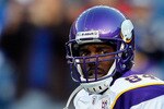 FOXBORO, MA - OCTOBER 31:  Randy Moss #84 of the Minnesota Vikings runs onto the field before a game against the New England Patriots at Gillette Stadium on October 31, 2010 in Foxboro, Massachusetts. (Photo by Jim Rogash/Getty Images)