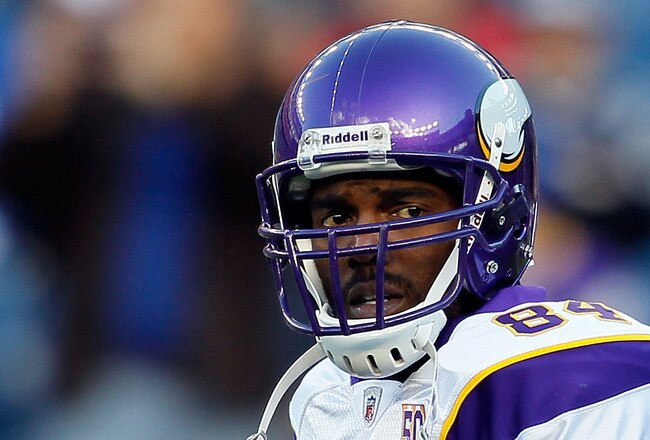 FOXBORO, MA - OCTOBER 31:  Randy Moss #84 of the Minnesota Vikings runs onto the field before a game against the New England Patriots at Gillette Stadium on October 31, 2010 in Foxboro, Massachusetts. (Photo by Jim Rogash/Getty Images)