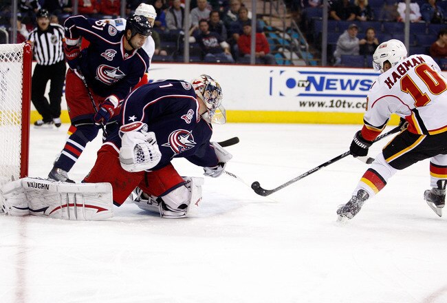 COLUMBUS, OH - OCTOBER 22:  Niklas Hagman #10 of the Calgary Flames beats goaltender Steve Mason #1 of the Columbus Blue Jackets for the first goal of the night during the first period on October 22, 2010 at Nationwide Arena in Columbus, Ohio.  (Photo by John Grieshop/Getty Images)