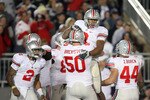 STATE COLLEGE, PA - NOVEMBER 7: Running back Brandon Saine #3 of the Ohio State Buckeyes celebrates his touchdown with offensive lineman Michael Brewster #50 during a game against the Penn State Nittany Lions on November 7, 2009 at Beaver Stadium in State College, Pennsylvania. Ohio State won 24-7. (Photo by Hunter Martin/Getty Images)