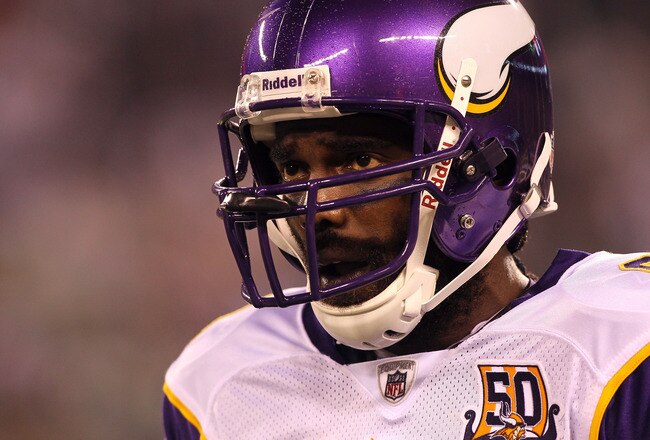 EAST RUTHERFORD, NJ - OCTOBER 11:  Randy Moss #84 of the Minnesota Vikings looks on against the New York Jets at New Meadowlands Stadium on October 11, 2010 in East Rutherford, New Jersey. The Jets won 29-20.  (Photo by Jim McIsaac/Getty Images)