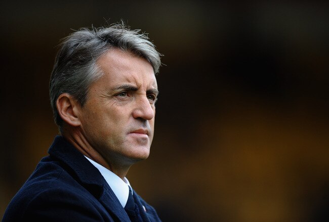 WOLVERHAMPTON, ENGLAND - OCTOBER 30:  Roberto Mancini of Manchester City looks on during the Barclays Premier League match between Wolverhampton Wanderers and Manchester City at Molineux on October 30, 2010 in Wolverhampton, England.  (Photo by Laurence Griffiths/Getty Images)