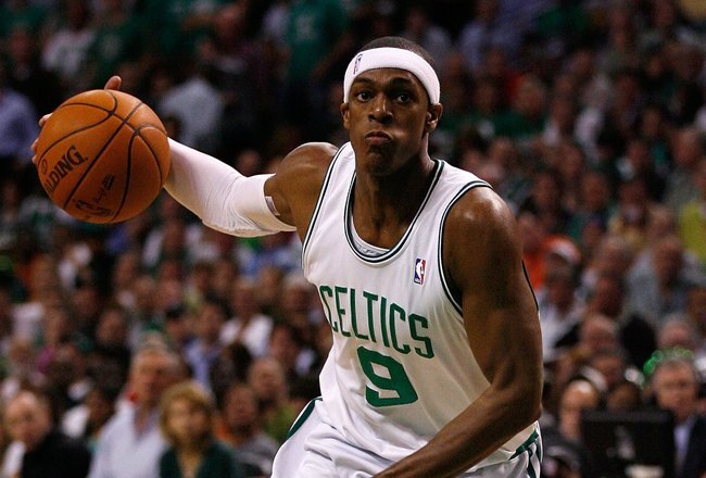 BOSTON - MAY 24:  Rajon Rondo #9 of the Boston Celtics drives against the Orlando Magic in Game Four of the Eastern Conference Finals during the 2010 NBA Playoffs at TD Banknorth Garden on May 24, 2010 in Boston, Massachusetts.  NOTE TO USER: User expressly acknowledges and agrees that, by downloading and/or using this Photograph, user is consenting to the terms and conditions of the Getty Images License Agreement.  (Photo by Elsa/Getty Images)