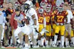 LOS ANGELES, CA - OCTOBER 30:  LaMichael James #21 of the Oregon Ducks runs down the sidelines to score a touchdown for a 15-10 lead over the USC Trojans at Los Angeles Memorial Coliseum on October 30, 2010 in Los Angeles, California.  (Photo by Harry How/Getty Images)