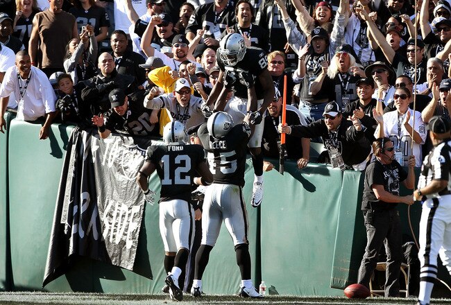 OAKLAND, CA - OCTOBER 31:  Darrius Heyward-Bey #85 of the Oakland Raiders is lifted in the air by Marcel Reece #45 after he ran in for a touchdown against the Seattle Seahawks at Oakland-Alameda County Coliseum on October 31, 2010 in Oakland, California.  (Photo by Ezra Shaw/Getty Images)