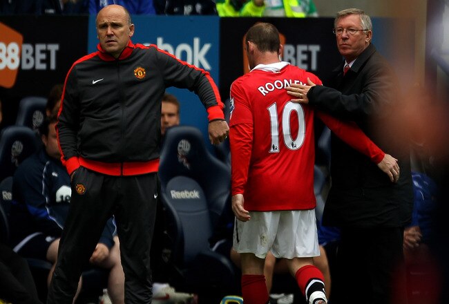 BOLTON, ENGLAND - SEPTEMBER 26:  Wayne Rooney of Manchester United is substituted during the Barclays Premier League match between Bolton Wanderers and Manchester United at the Reebok Stadium on September 26, 2010 in Bolton, England.  (Photo by Alex Livesey/Getty Images)