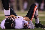 EAST RUTHERFORD, NJ - OCTOBER 03:  Todd Collins #10 of the Chicago Bears lays on the field after getting injured against the New York Giants at New Meadowlands Stadium on October 3, 2010 in East Rutherford, New Jersey.  (Photo by Chris McGrath/Getty Images)