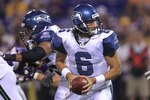 MINNEAPOLIS - AUGUST 28:  Charlie Whitehurst #6 of the Seattle Seahawks looks to hand off against the Minnesota Vikings during a preseason NFL game at Mall of America Field at the Hubert H. Humphrey Metrodome on August 28, 2010  in Minneapolis, Minnesota.  (Photo by Chris McGrath/Getty Images)