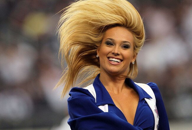 ARLINGTON, TX - OCTOBER 31:  A Dallas Cowboys cheerleader performs at Cowboys Stadium on October 31, 2010 in Arlington, Texas.  (Photo by Stephen Dunn/Getty Images)