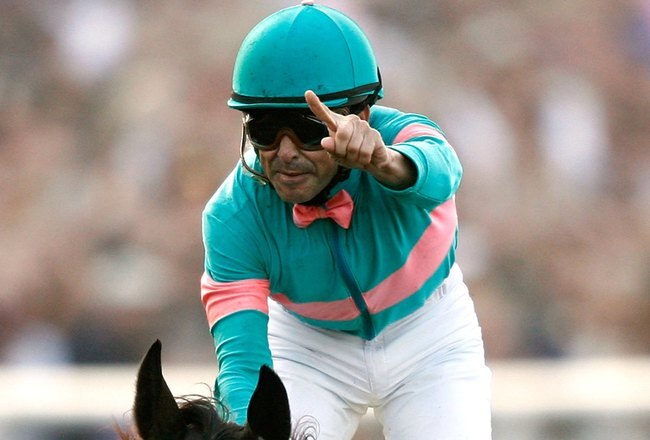 ARCADIA, CA - NOVEMBER 07:  Jockey Mike Smith celebrates as he crosses the finish line to win the Breeders' Cup Classic race on Zenyatta during the Breeders' Cup World Championships at Santa Anita Park November 7, 2009 in Arcadia, California.  (Photo by Matthew Stockman/Getty Images)