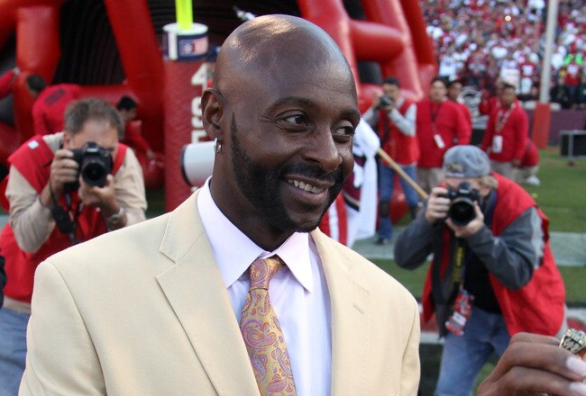 SAN FRANCISCO - SEPTEMBER 20:  Jerry Rice of the San Francisco 49ers is given a ring by the 49ers during a pregame ceremony before their game against the New Orleans Saints at Candlestick Park on September 20, 2010 in San Francisco, California.  (Photo by Ezra Shaw/Getty Images)