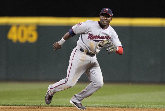 SEATTLE - AUGUST 27:  Second baseman Orlando Hudson #1 of the Minnesota Twins follows the play against the Seattle Mariners at Safeco Field on August 27, 2010 in Seattle, Washington. The Twins won 6-3. (Photo by Otto Greule Jr/Getty Images)