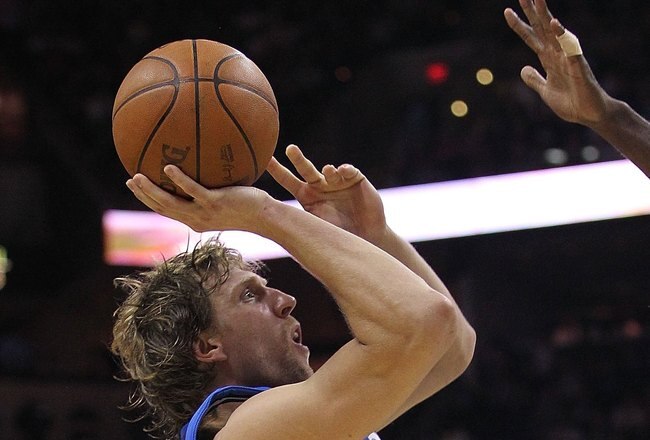 SAN ANTONIO - APRIL 29:  Dirk Nowitzki #41 of the Dallas Mavericks in Game Six of the Western Conference Quarterfinals during the 2010 NBA Playoffs at AT&T Center on April 29, 2010 in San Antonio, Texas. NOTE TO USER: User expressly acknowledges and agrees that, by downloading and or using this photograph, User is consenting to the terms and conditions of the Getty Images License Agreement.  (Photo by Ronald Martinez/Getty Images)
