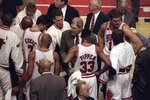 7 Jun 1998:  Coach Phil Jackson talks with Tony Kukoc, Jud Buechler, Luc Longley, Michael Jordan #23, Scottie Pippen #33, and Ron Harper of the Chicago Bulls during the NBA Finals Game 3 against the Utah Jazz at the United Center in Chicago, Illinois.  The Bulls defeated the Jazz 96-54. Mandatory Credit: Jonathan Daniel  /Allsport