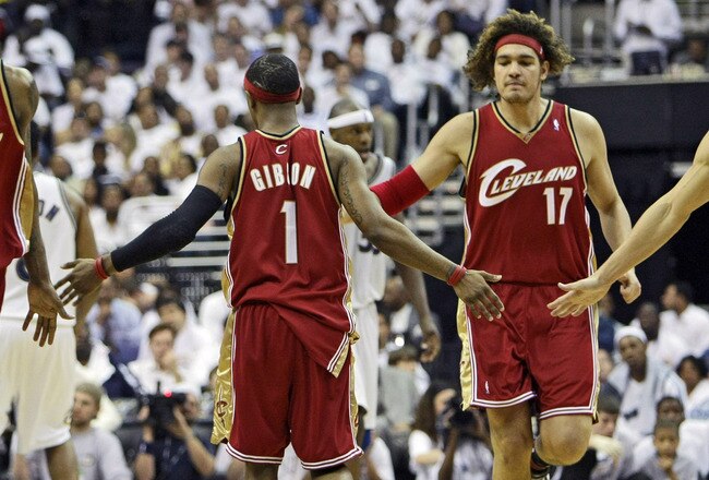 WASHINGTON - MAY 2: Daniel Gibson #1 Washington Wizards gets congratulated for hitting a 3-point-shot by teammates Joe Smith #32, Anderson Varejao #17 and Wally Szczerbiak #10 during the game against the Washington Wizards in Game Six of the Eastern Conference Quarterfinals during the 2008 NBA Playoffs at the Verizon Center on May 2, 2008 in Washington, DC. The Cavaliers won 105-88 to advance to the next round. NOTE TO USER: User expressly acknowledges and agrees that, by downloading and or using this photograph, User is consenting to the terms and conditions of the Getty Images License Agreement. (Photo by Drew Hallowell/Getty Images)