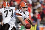 KANSAS CITY, MO - DECEMBER 20:  Quarterback Brady Quinn #10 of the Cleveland Browns reaches out to hand the ball off during their NFL game against the Kansas City Chiefs on December 20, 2009 at Arrowhead Stadium in Kansas City, Missouri. The Browns defeated the Chiefs 41-34. (Photo by Jamie Squire/Getty Images)