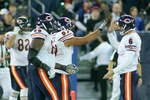 TORONTO, ON - NOVEMBER 07: Jay Cutler #6 and Olin Kreutz #57  of the Chicago Bears celebrate Earl Bennett's game winning touchdown against the Buffalo Bills  at Rogers Centre on November 7, 2010 in Toronto, Canada. Chicago won 22-19. (Photo by Rick Stewart/Getty Images)