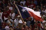 ARLINGTON, TX - NOVEMBER 01:  A fan waves a Texas state flag while the Texas Rangers play against the San Francisco Giants in Game Five of the 2010 MLB World Series at Rangers Ballpark in Arlington on November 1, 2010 in Arlington, Texas.  (Photo by Doug Pensinger/Getty Images)