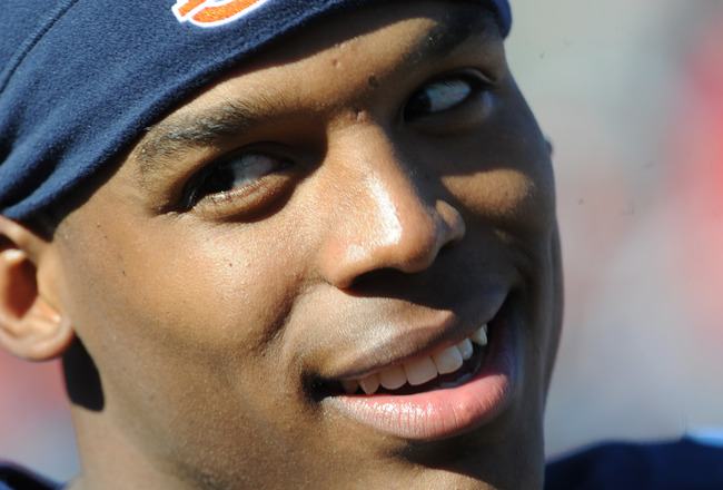 AUBURN, AL - NOVEMBER 6:  Quarterback Cam Newton #2 of the Auburn Tigers watches a replay of a touchdown run against the Chattanooga Mocs November 6, 2010 at Jordan-Hare Stadium in Auburn, Alabama.  (Photo by Al Messerschmidt/Getty Images)