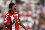 BUENOS AIRES, ARGENTINA - FEBRUARY 10:  Ariel Ortega of River Plate gives instructions during the Primera Division closing season match between River Plate and Gimnasia de Jujuy at the Estadio Monumental on February 10, 2008 in Buenos Aires, Argentina.  (Photo by Julian Finney/Getty Images)