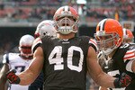 CLEVELAND - NOVEMBER 07:  Running back Peyton Hillis #40 and Alex Mack #55 of the Cleveland Browns celebrate after a touchdown against the New England Patriots at Cleveland Browns Stadium on November 7, 2010 in Cleveland, Ohio.  (Photo by Matt Sullivan/Getty Images)
