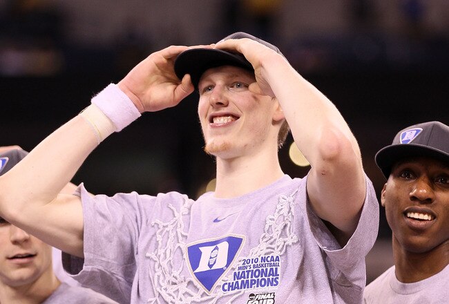 INDIANAPOLIS - APRIL 05: (L-R) Kyle Singler #12 and Nolan Smith #2 of the Duke Blue Devils celebrate after the Blue Devils defeat the Butler Bulldogs 61-59 in the 2010 NCAA Division I Men's Basketball National Championship game at Lucas Oil Stadium on April 5, 2010 in Indianapolis, Indiana.  (Photo by Andy Lyons/Getty Images)
