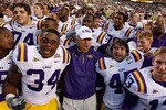 BATON ROUGE, LA - NOVEMBER 06:  Head coach Les Miles of the Louisiana State University Tigers celebrates with his team after defeating the Alabama Crimson Tide 24-21 at Tiger Stadium on November 6, 2010 in Baton Rouge, Louisiana.  (Photo by Chris Graythen/Getty Images)