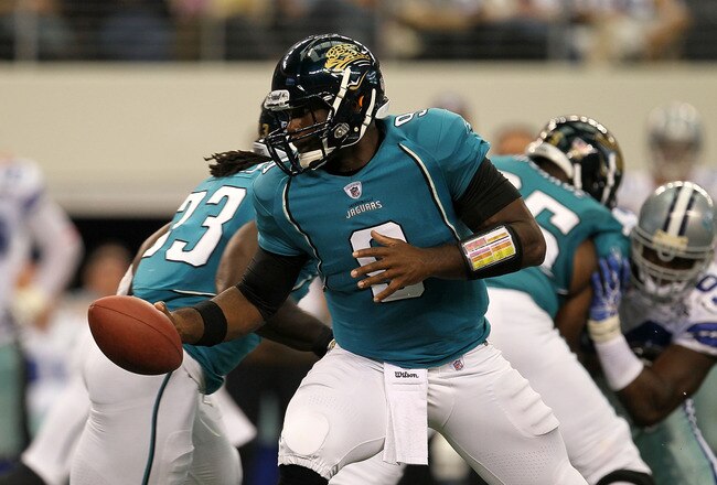 ARLINGTON, TX - OCTOBER 31:  Quaterback David Garrard #9 of the Jacksonville Jaguars turns to hand the ball off against the Dallas Cowboys at Cowboys Stadium on October 31, 2010 in Arlington, Texas.  (Photo by Stephen Dunn/Getty Images)